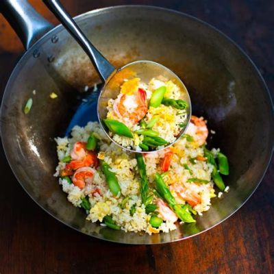  Wok-Gebratener Reis mit Garnelen und Mangos: Ein exotisches Zusammenspiel von süßen Früchten und pikanten Meeresfrüchten?